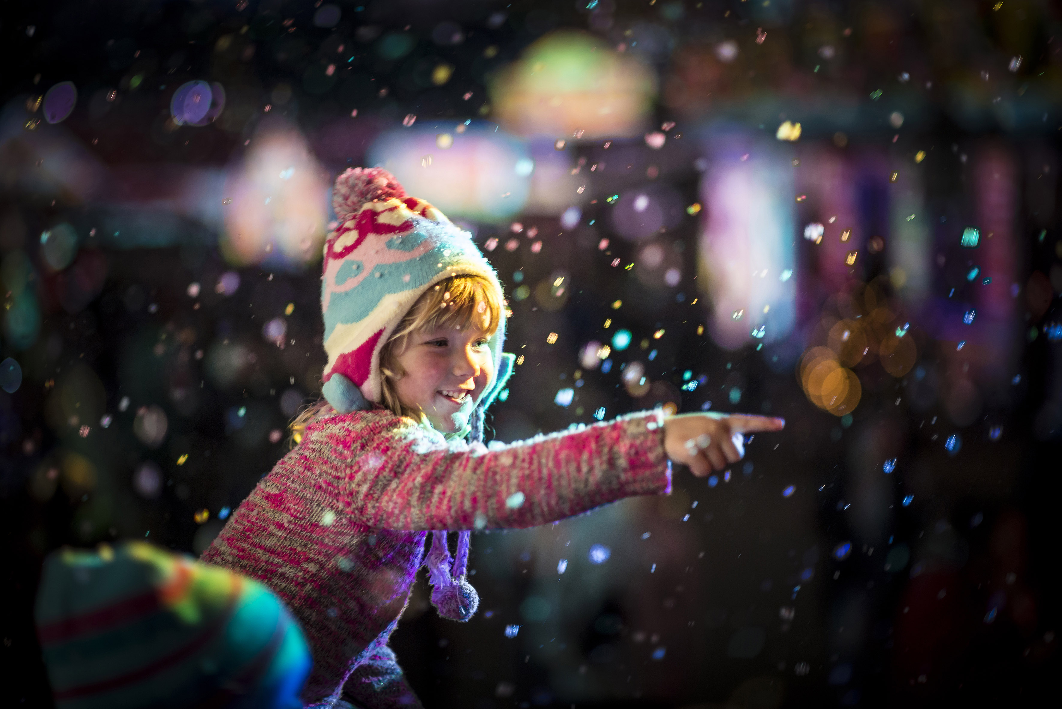 Child pointing at snow at Sovereign Hill.