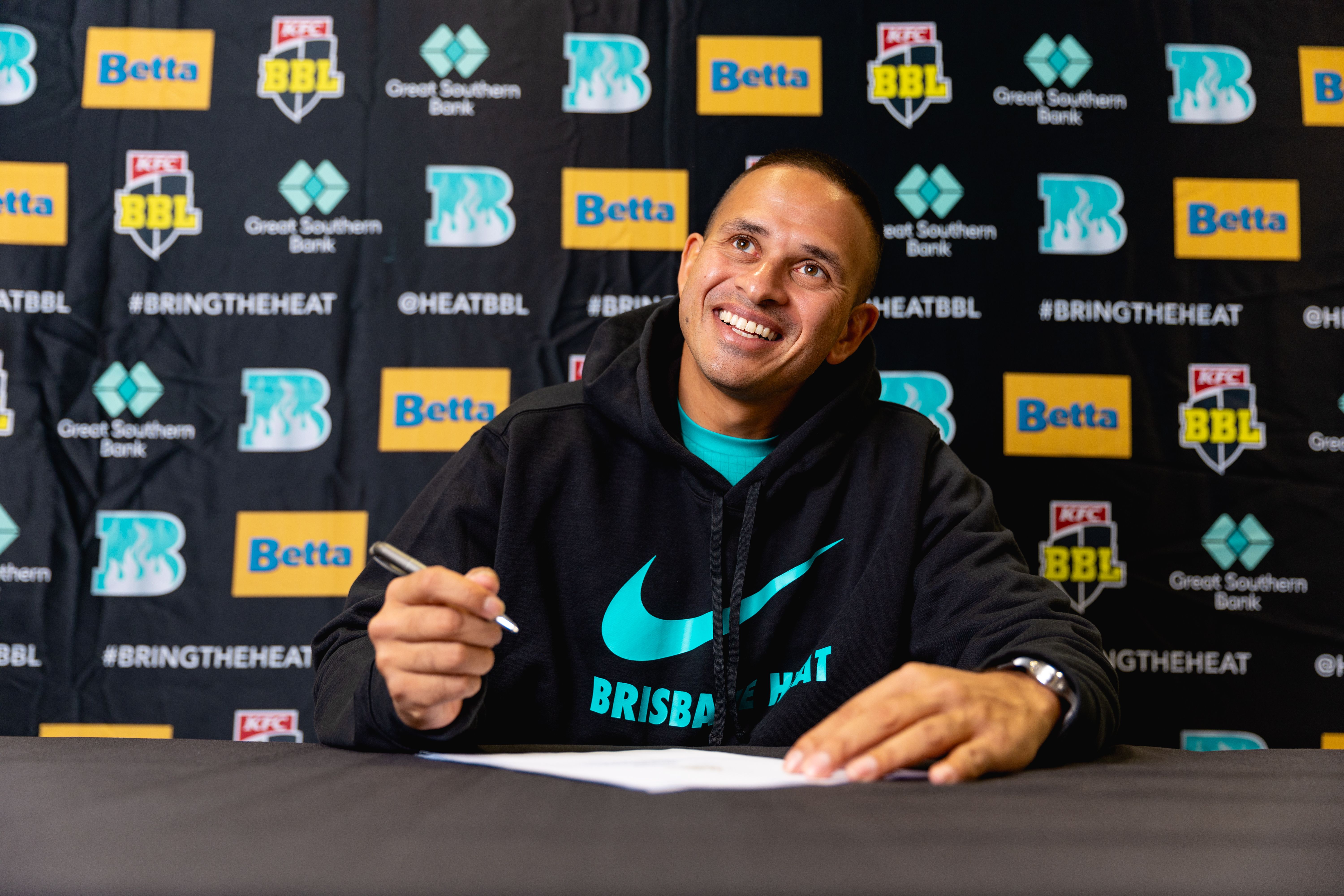 Usman Khawaja signing