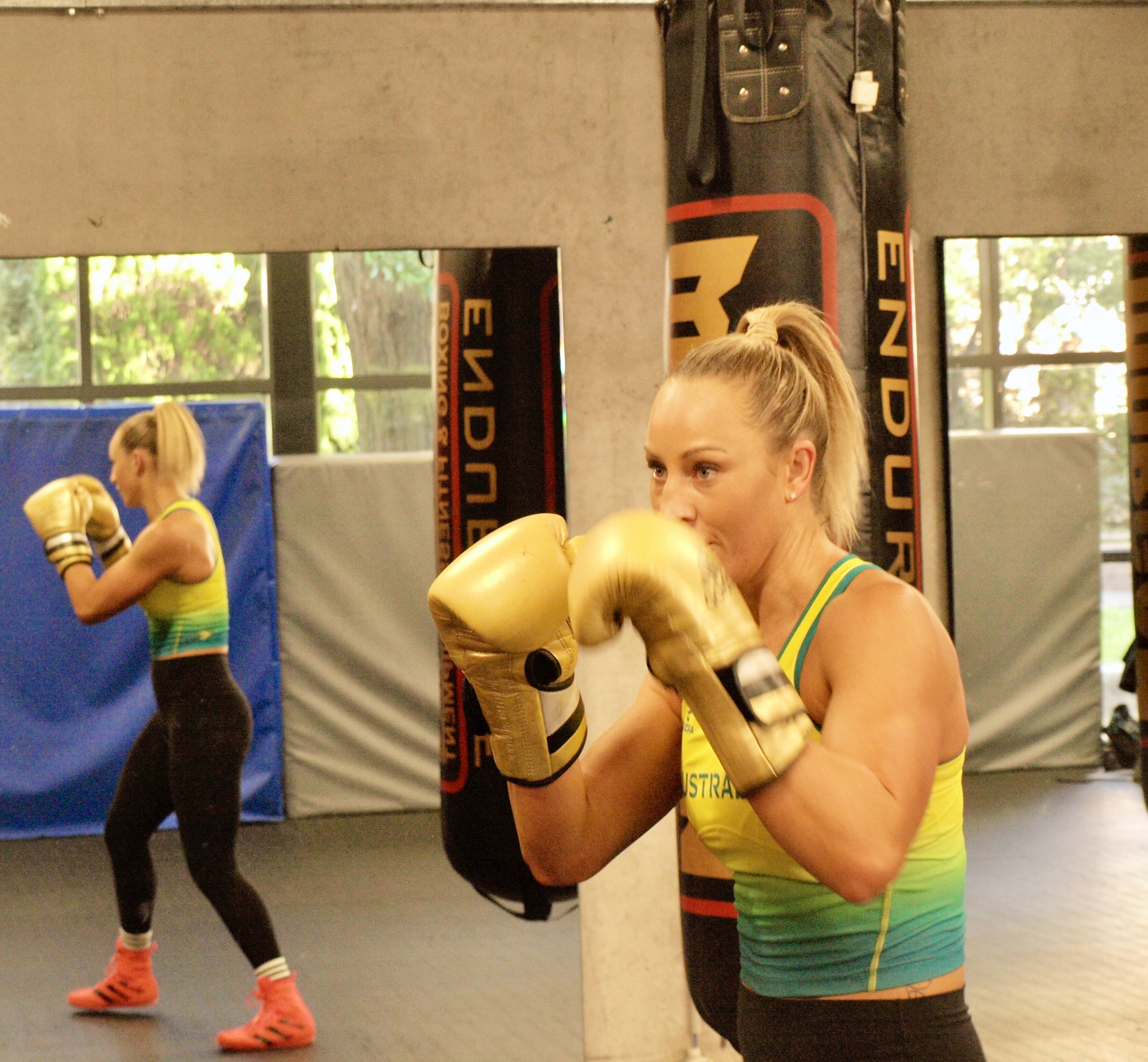 Kaye Scott working out at the PCYC in the gloves that show her ambition. 