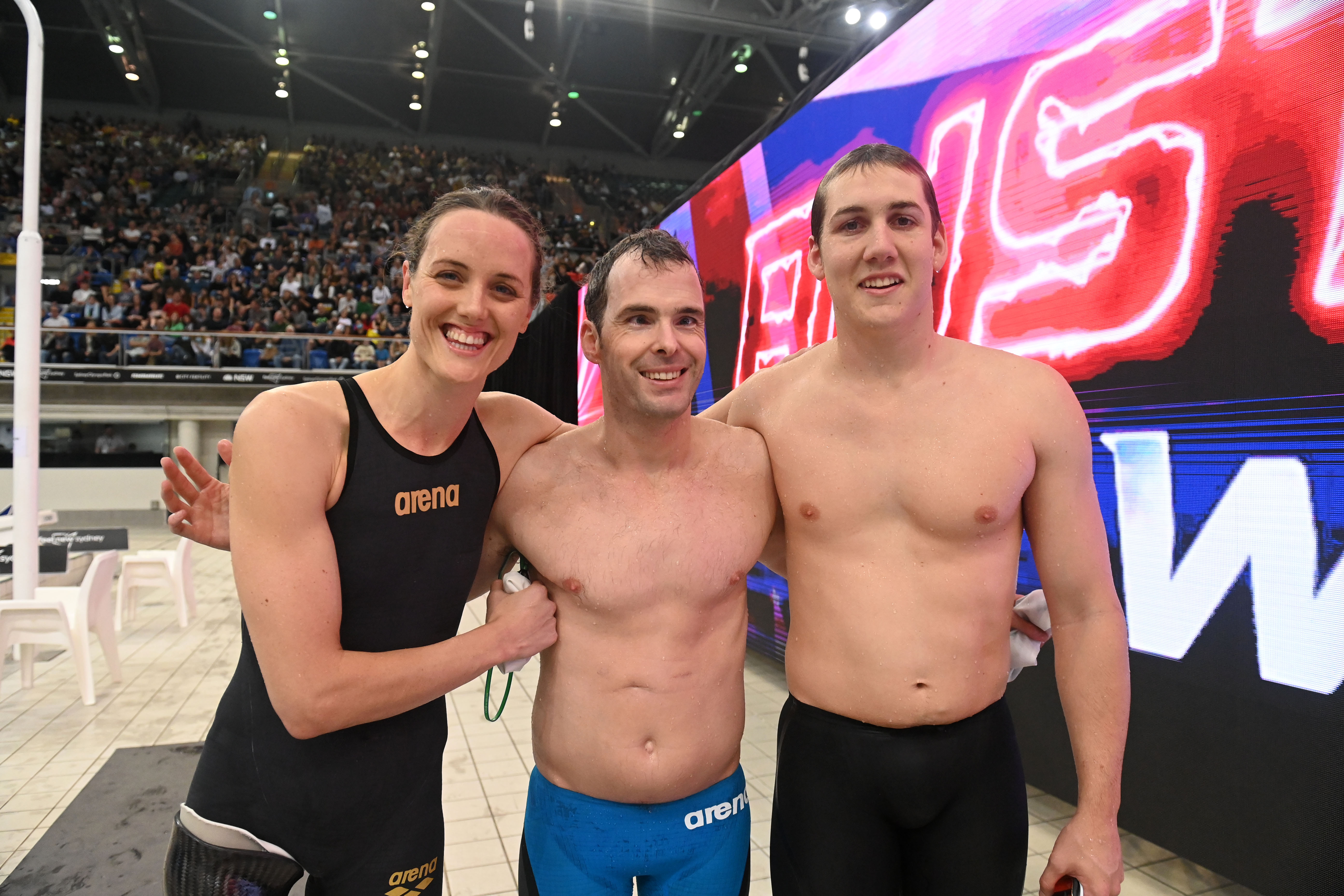 Veteran para-swimmers Ellie Cole and Matt Levy (L-R) in their last competitive swim, alongside rising para-swimming star Will Martin. Image: Delly Carr / Swimming Australia