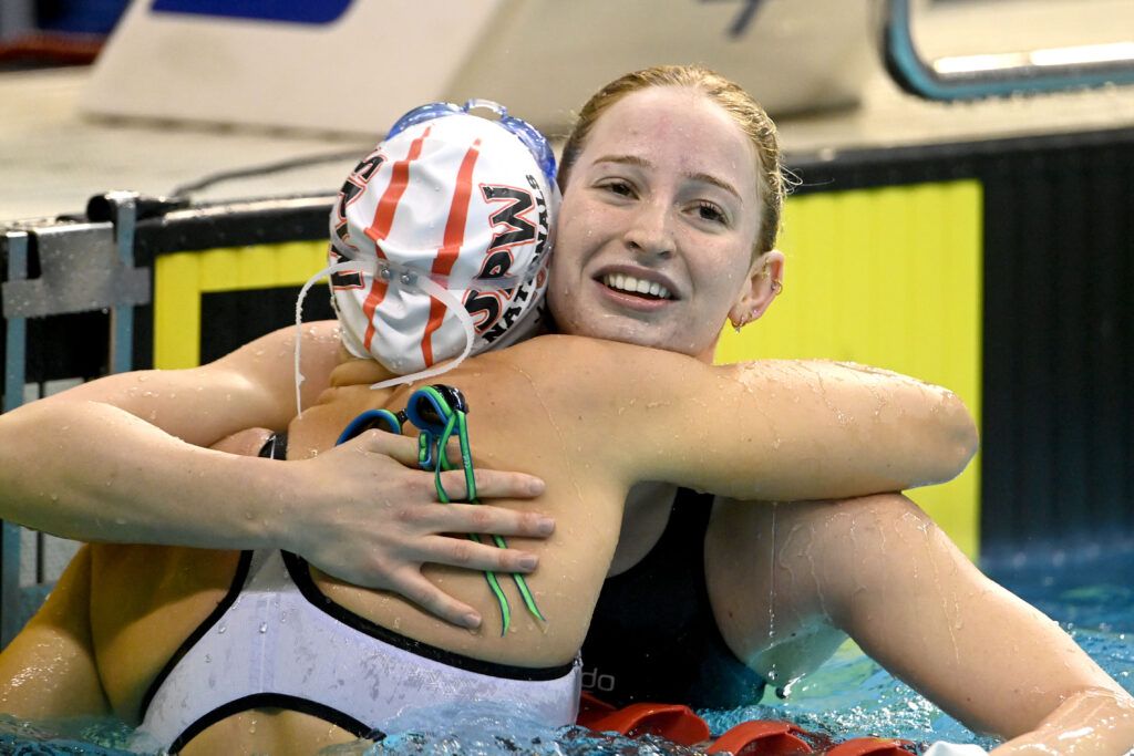 Mollie O'Callaghan embraces teammate Shayna Jack after the 100m Freestyle Final on Night One in Adelaide.
Photo: Delly Carr/Swimming Australian