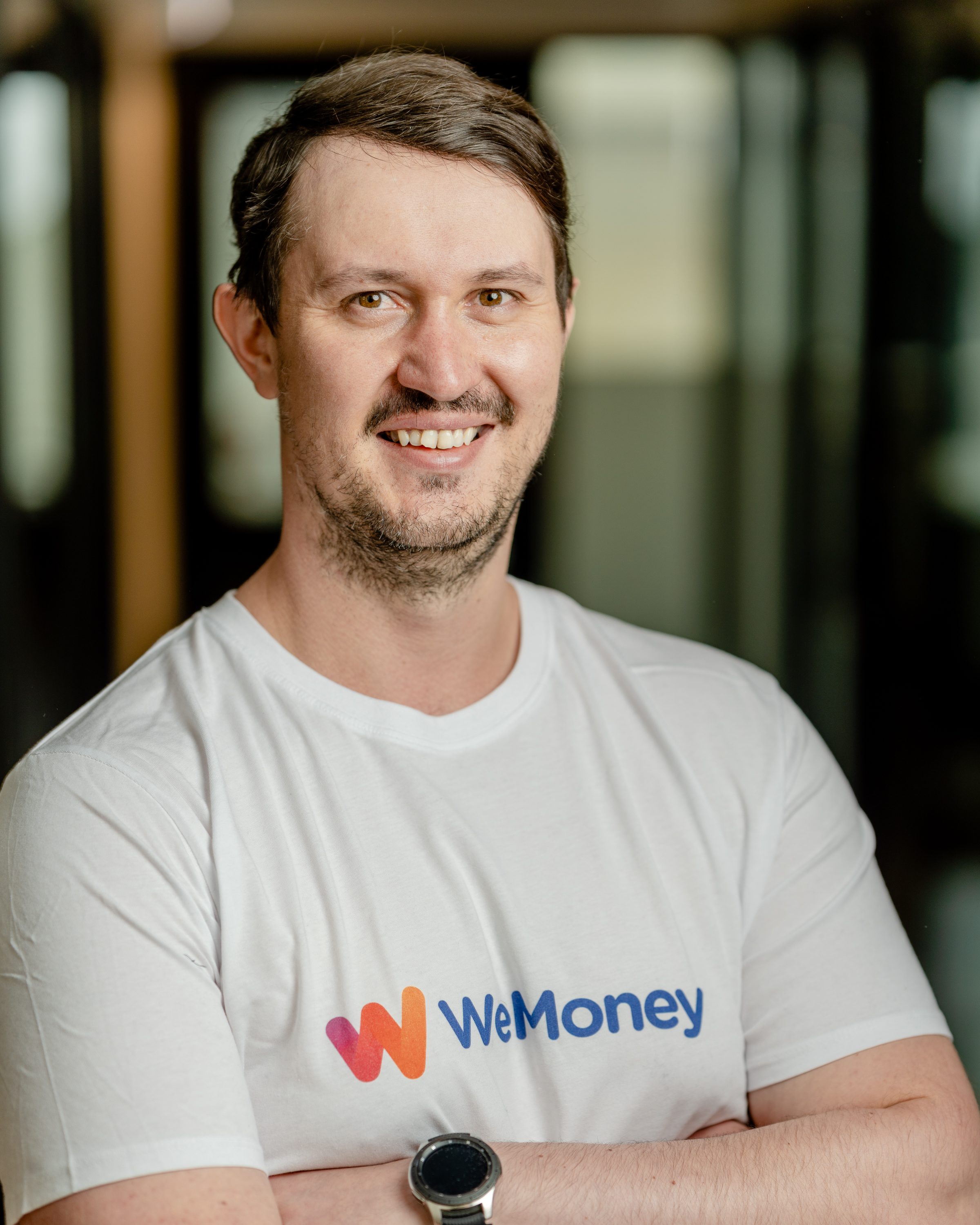 Founder of WeMoney Dan Jovevski solo image with WeMoney T-shirt