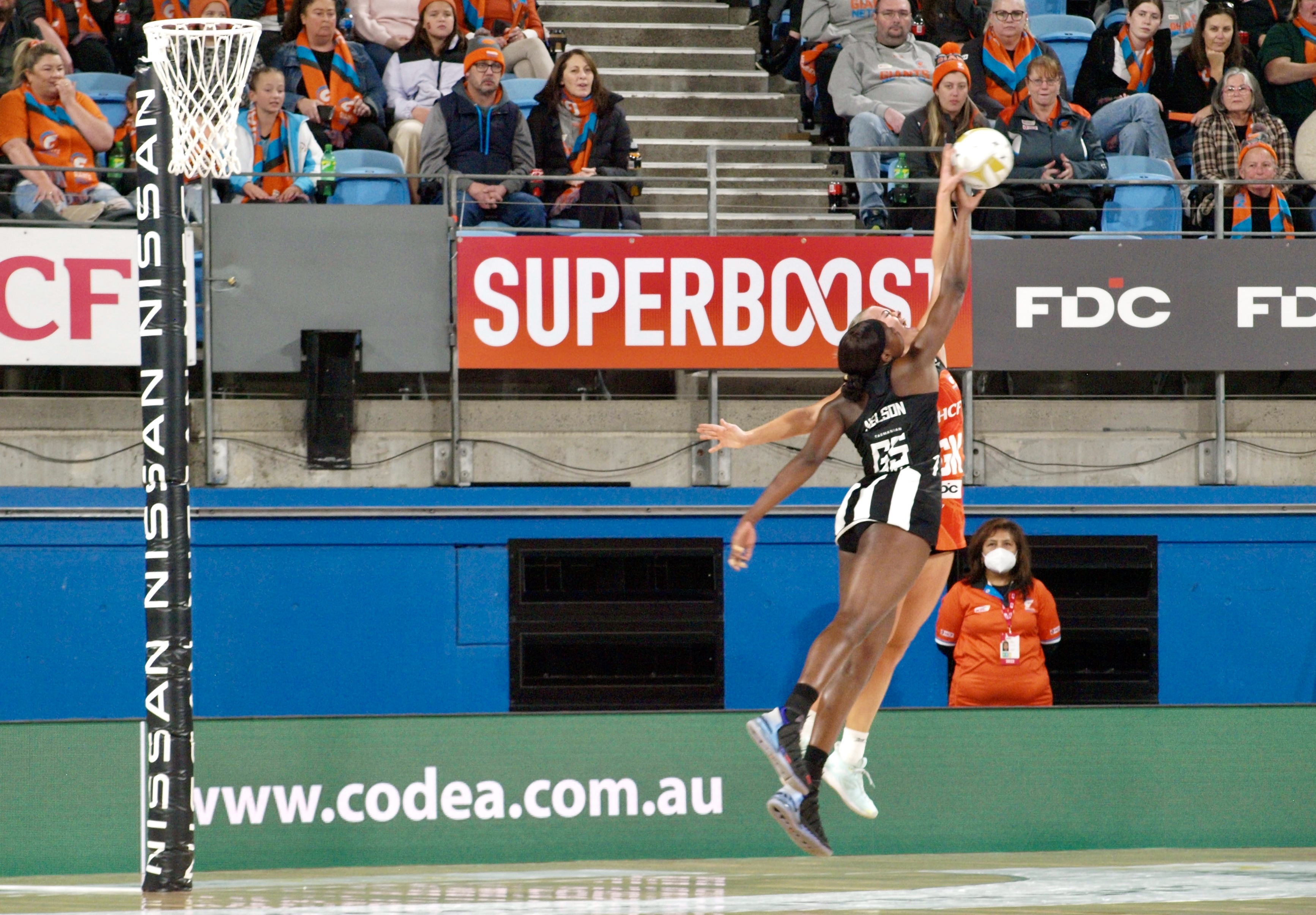 Shimona Nelson leaps for the ball in 2022, against Tilly McDonell. Image: Raheemah Bolkiah