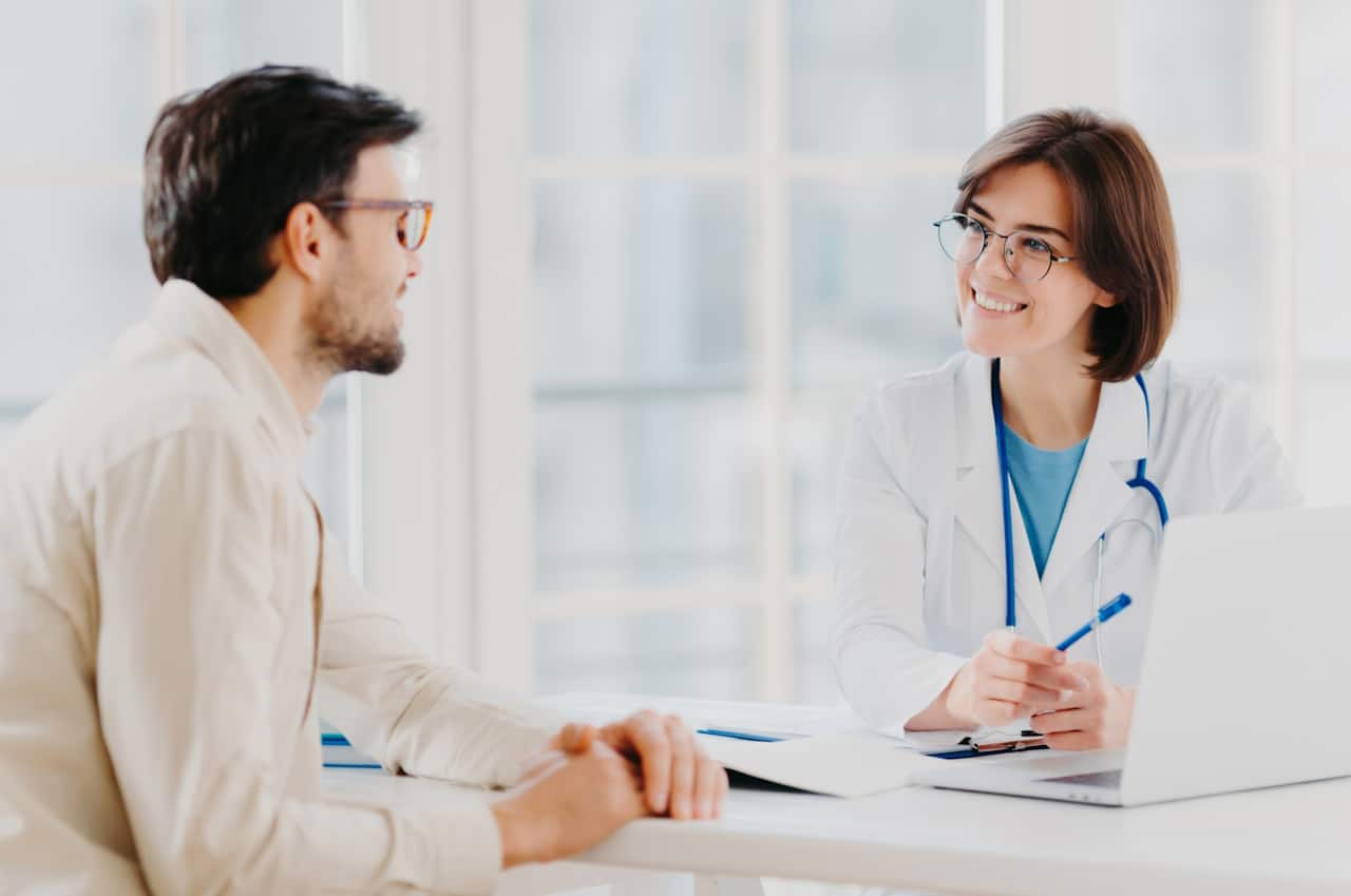 Doctor speaking with a patient