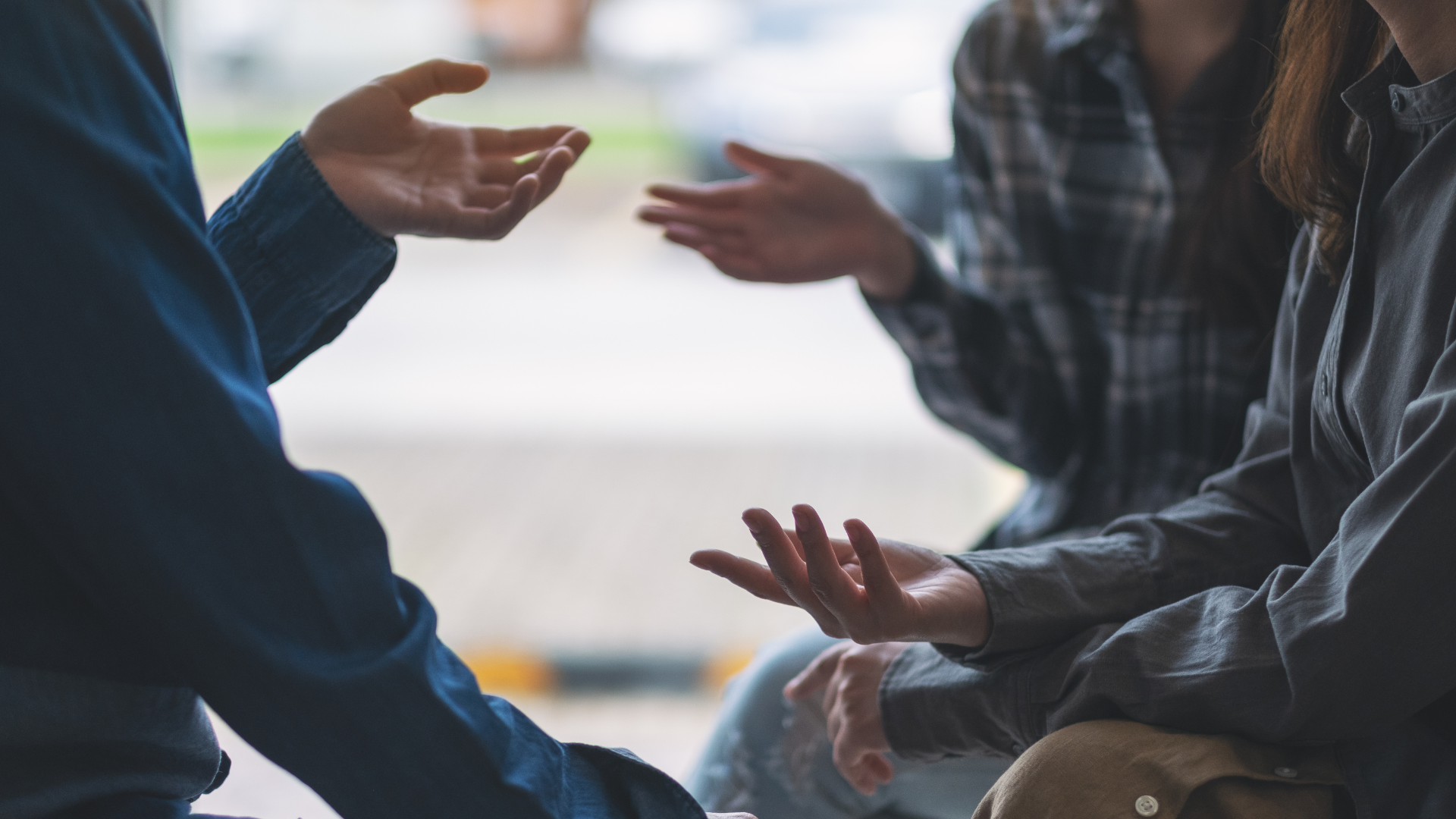 A group of people having a conversation around faith