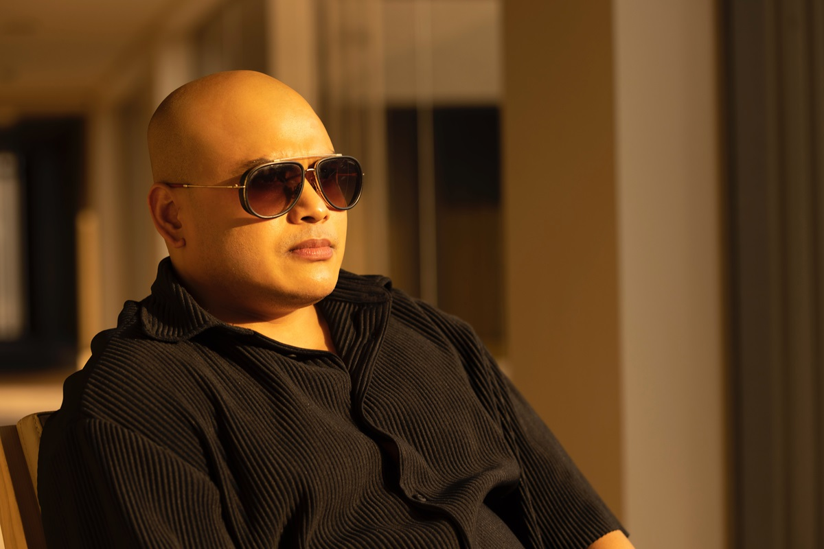 bald guy wearing sunglasses
