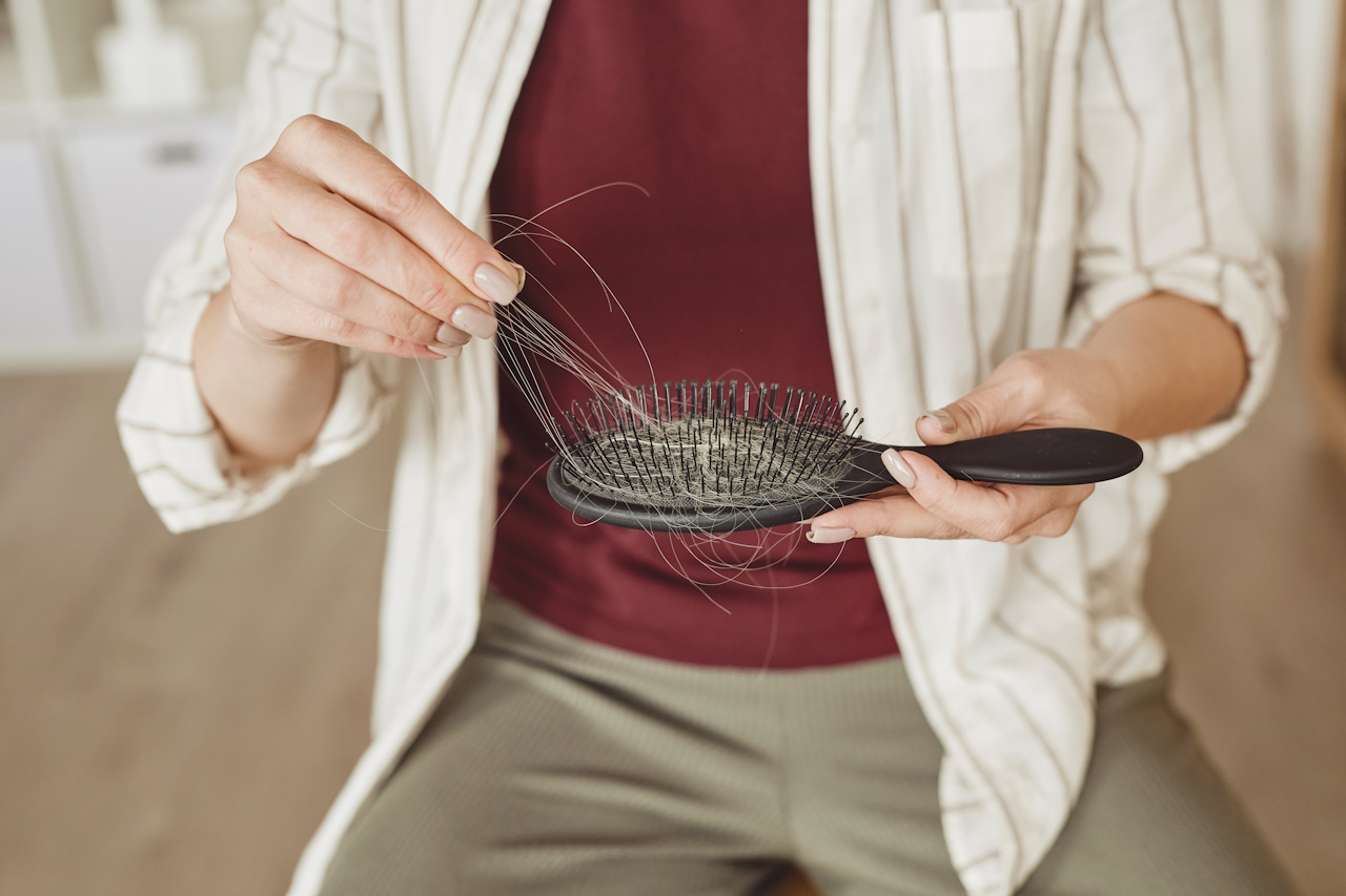 Pulling hair from hairbrush