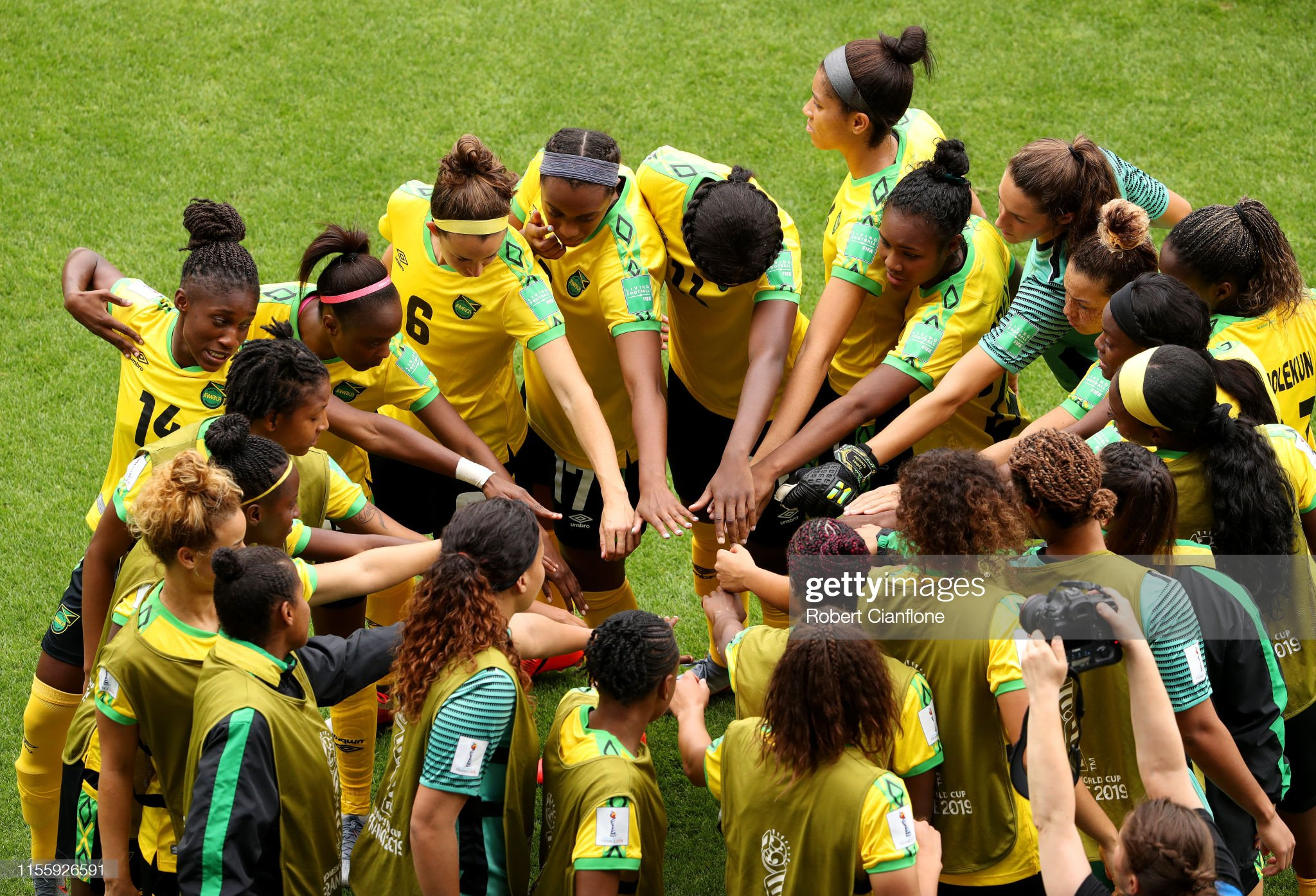 REIMS, FRANCE - JUNE 14: The Jamaica players form a team huddle prior to the 2019 FIFA Women's World Cup France group C match between Jamaica and Italy at Stade Auguste Delaune on June 14, 2019 in Reims, France. (Photo by Robert Cianflone/Getty Images)