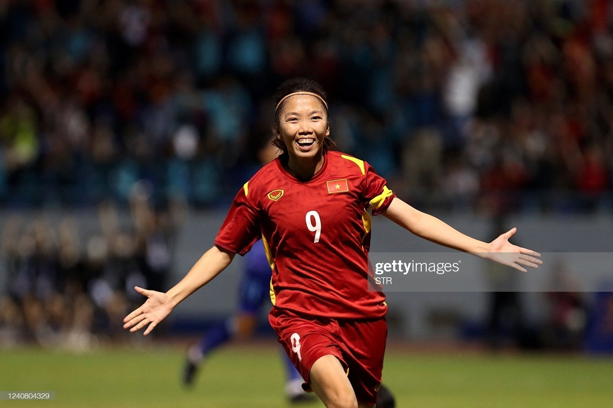 This picture taken and released by the Vietnam News Agency on May 21, 2022 shows Vietnam's Huynh Nhu celebrating after scoring against Thailand in the women's football final match during the 31st Southeast Asian Games (SEA Games) at the Cam Pha stadium in Quang Ninh province. (Photo by Vietnam News Agency / AFP) (Photo by STR/Vietnam News Agency/AFP via Getty Images)