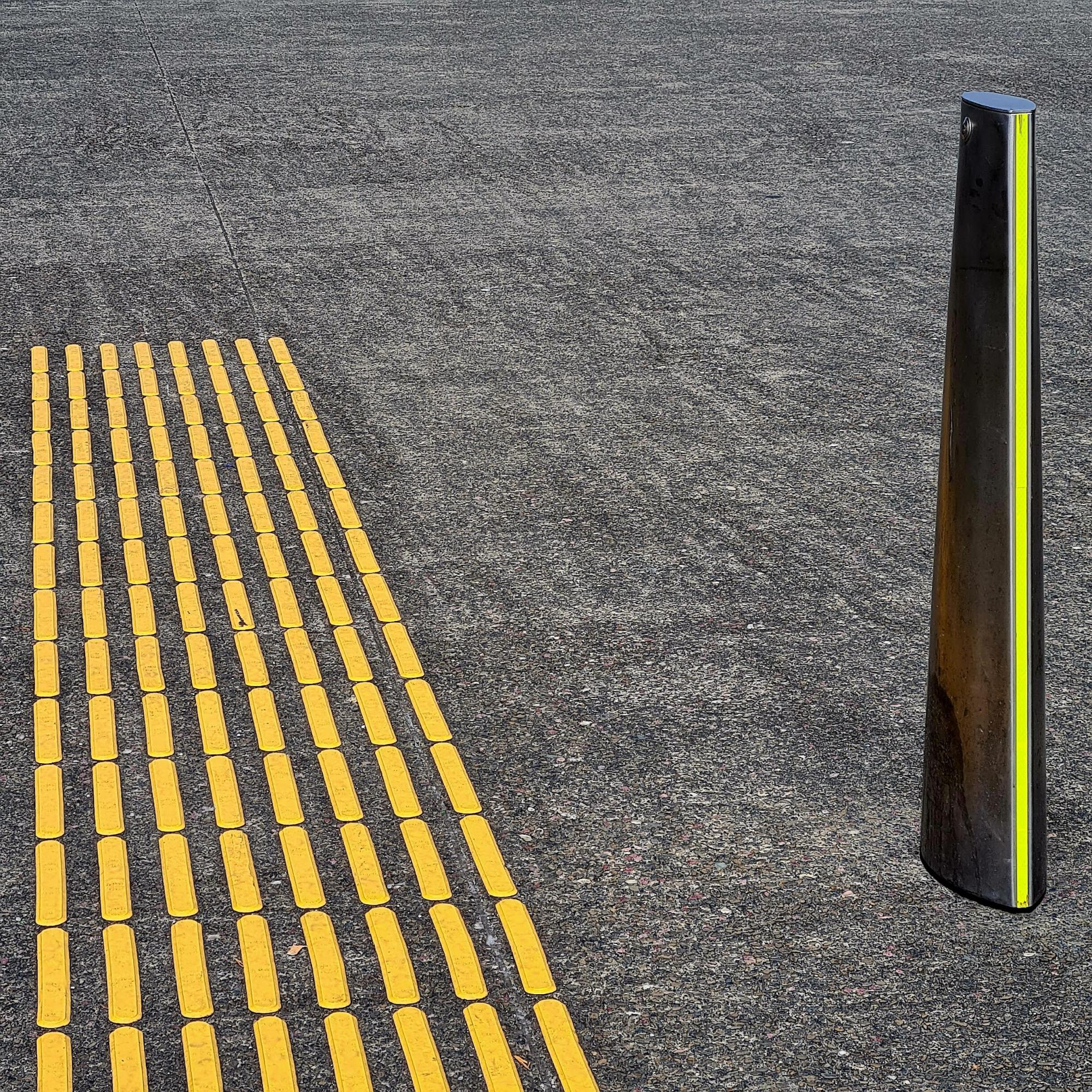 Including bold colours: The colour of these pavers is integral to their purpose - to assist the visually impaired navigate the city.