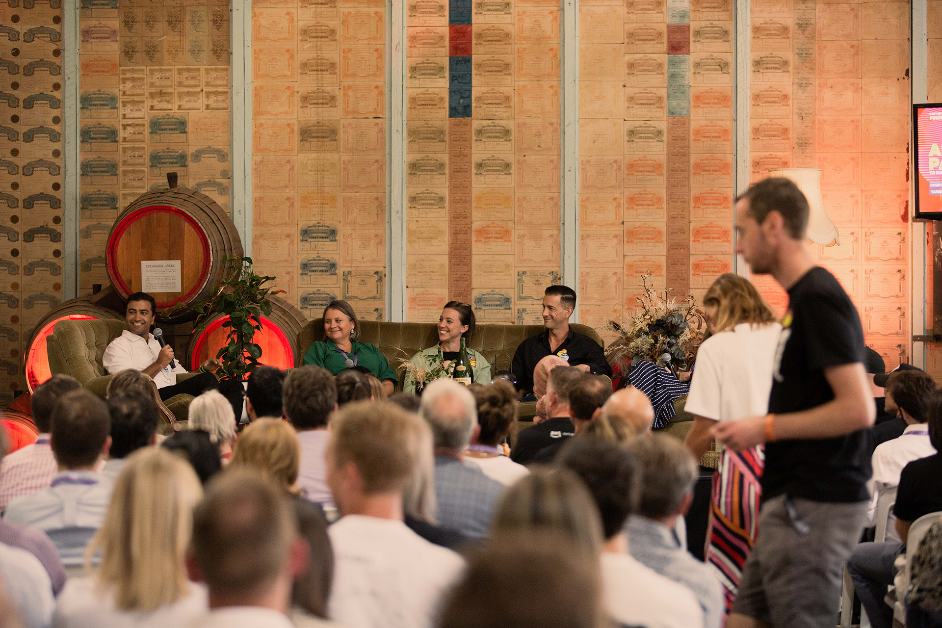 A panel of speakers on a stage in front of a crowd at a previous _SOUTHSTART festival.