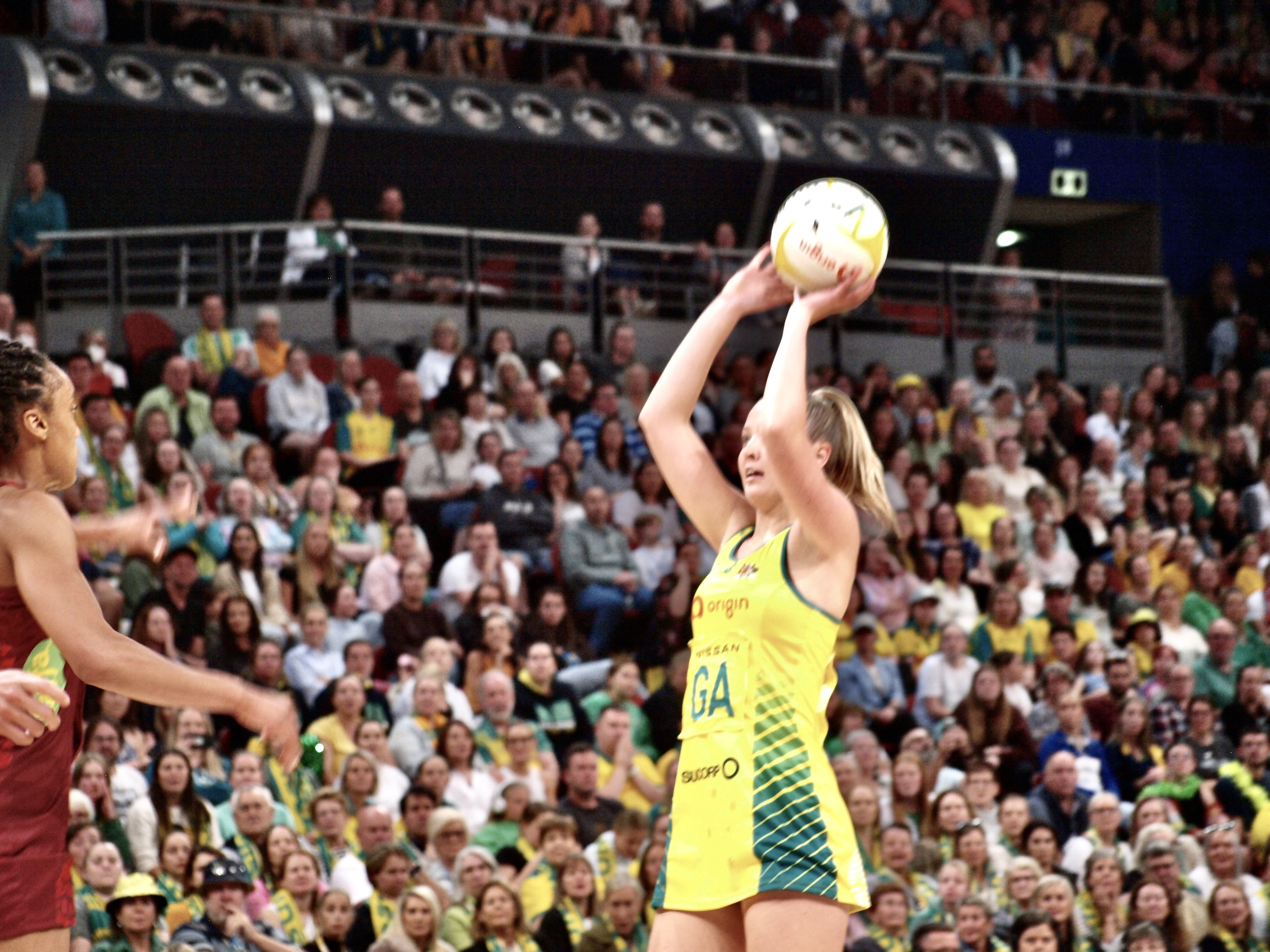 Kiera Austin shoots for the Diamonds in front of the packed Sydney crowd.