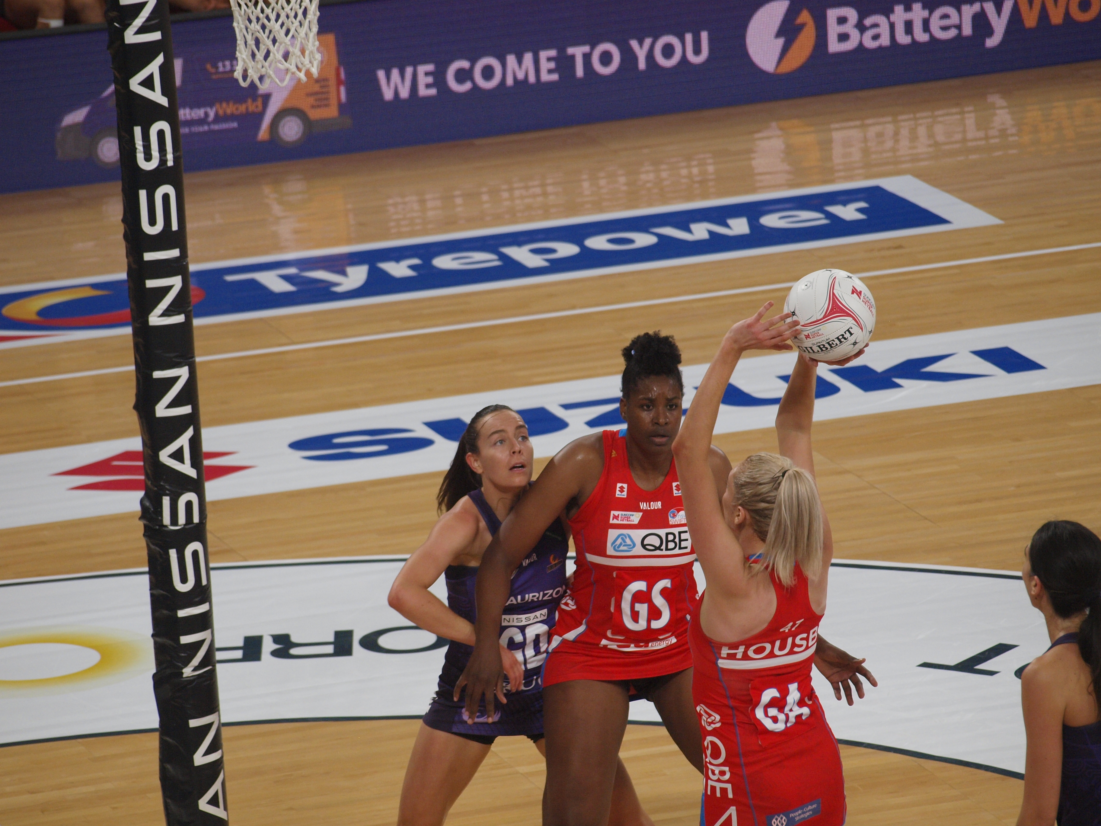 Ruby Bakewell-Doran pushes in closer to the post than Romelda Aiken-George, positioning for the rebound. Image: Dan Coppel