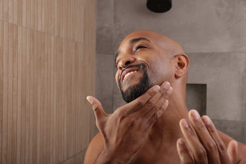 Man applying pre-shave oil