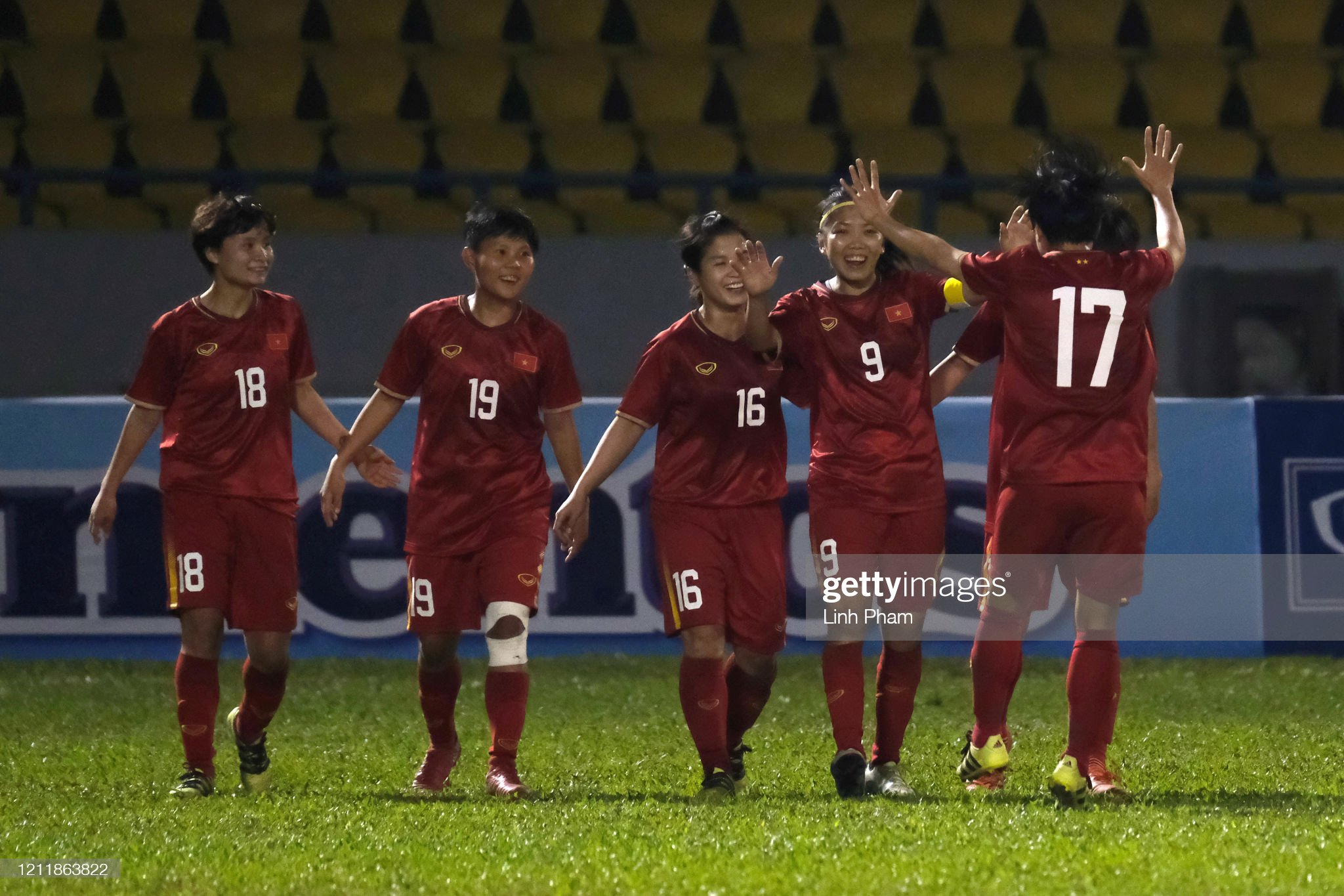 CAM PHA, VIETNAM - MARCH 11: Huynh Nhu (2nd R) of Vietnam celebrates her side's first goal with her team mates during the Women's Olympic Football Tournament Play-Off 2nd Leg between Vietnam and Australian Matildas at Cam Pha Stadium on March 11, 2020 in Cam Pha, Vietnam. (Photo by Linh Pham/Getty Images)