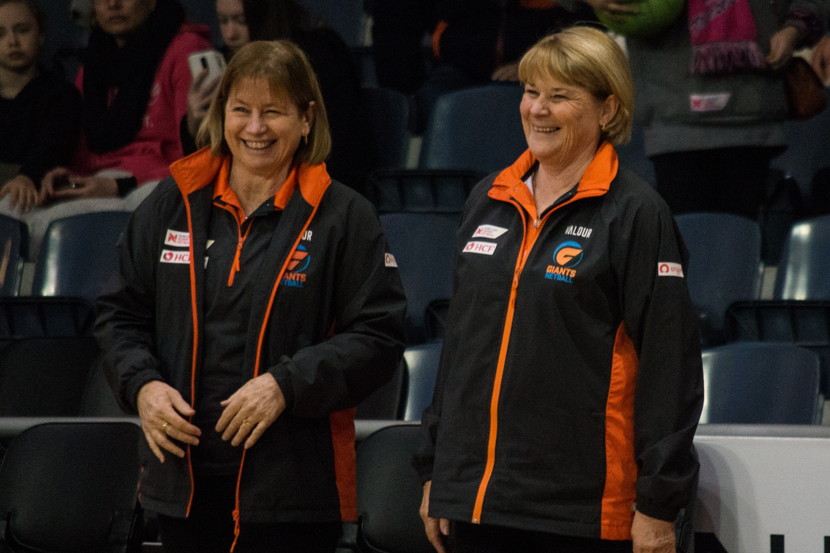 Julie Fitzgerald (R) shares a laugh with assistant coach Jenny Nicholls on the SSN bench. Image: Dani Brown