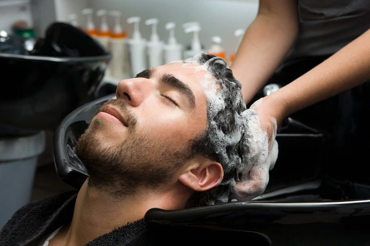 Man having his hair shampood