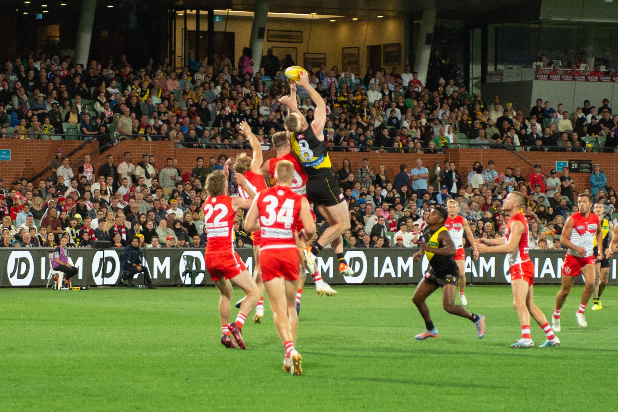 Jack Reiwoldt flies high for a mark against the Swans. Image: Dani Brown