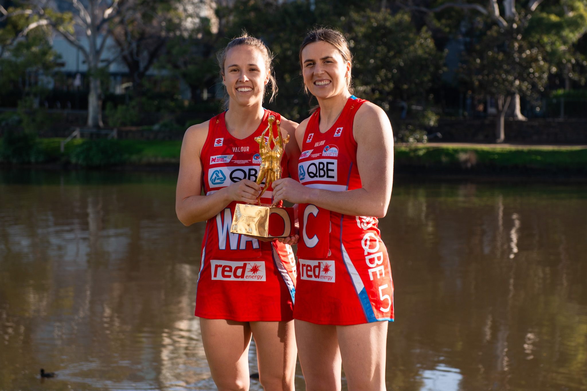 Paige Hadley and Maddy Proud have lifted the grand final trophy before, and will be hoping to do so again this weekend. Image: Dani Brown